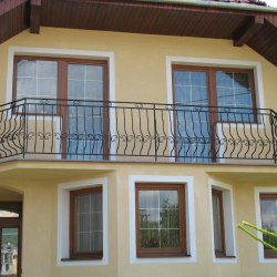 A wrought iron balcony railing