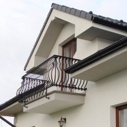 A wrought iron balcony railing