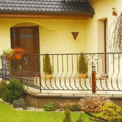 A wrought iron terrace railing