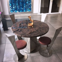 A modern stainless steel table - a futuristic design